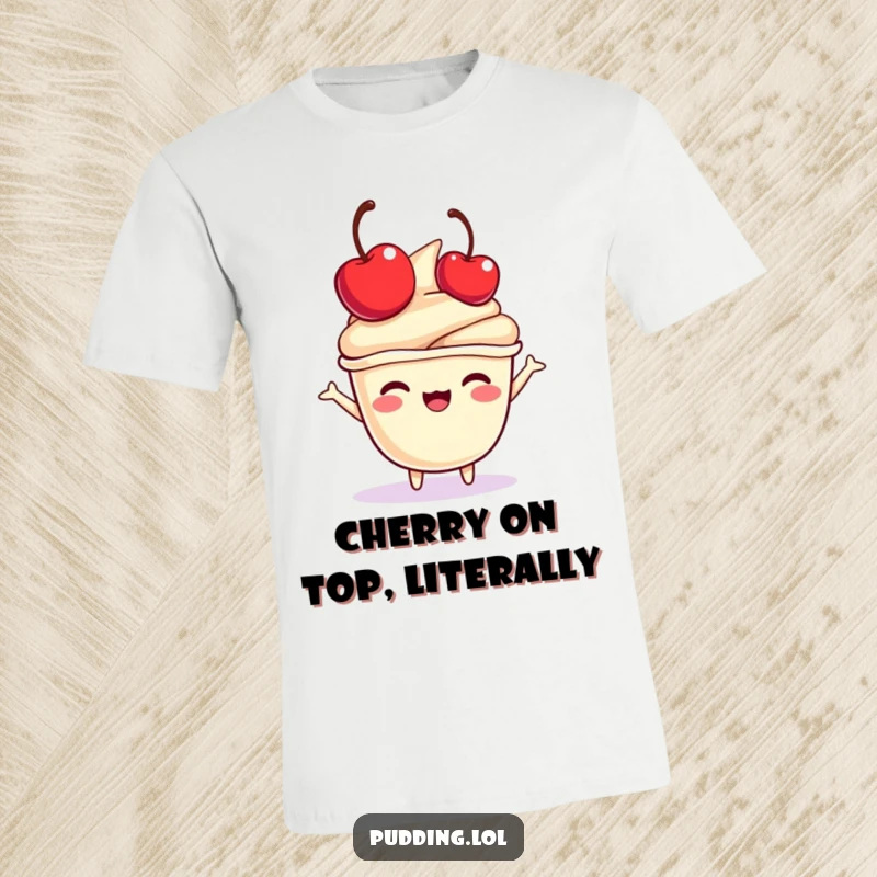 Funny pudding cup character t-shirt joyfully bouncing a mini cherry on its head, perfect for lovers of sweet treats.